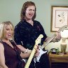 Still of Christina Applegate and Rainn Wilson in The Rocker