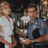 Still of Nicolas Cage and Bridget Fonda in It Could Happen to You