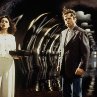 Still of Sam Neill and Julie Carmen in In the Mouth of Madness