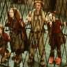 The Clock family - Peagreen (Tom Felton), Homilly (Celia Imrie), Pod (Jim Broadbent) and Arrietty (Flora Newbigin) behind bars.