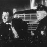 Still of Christian Slater and Edward Asner in Hard Rain