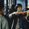 Still of Sylvia Chang and Xio Fei Han in The Red Violin