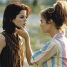 Still of Neve Campbell and Denise Richards in Wild Things