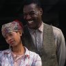 Still of Erykah Badu and Delroy Lindo in The Cider House Rules