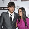 Demi Moore and Ashton Kutcher at event of The Joneses