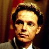 Bruce Greenwood appears as William Sokal