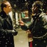 Still of Nicolas Cage and Don Cheadle in The Family Man