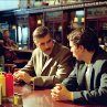 Still of George Clooney and Sam Rockwell in Confessions of a Dangerous Mind