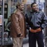 Still of Ice Cube and Anthony Anderson in Barbershop
