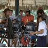 Kevin Heffernan (far left), Erik Stolhanske (blue shirt) Director Jay Chandrasekhar (center).