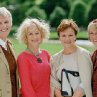 Legendary actresses Helen Mirren (center left) and Julie Walters (center right) pose with the inspirations for their characters: two of the original 