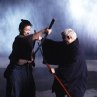 Still of Takeshi Kitano and Tadanobu Asano in The Blind Swordsman: Zatoichi