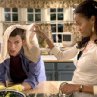 Ashton Kutcher (l) and ZoÃ« SaldaÃ±a star in Columbia Pictures/Regency EnterprisesÂ’ new comedy Guess Who.     