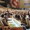 Director/Executive Producer SYDNEY POLLACK on the floor of the General Assembly during filming of The Interpreter, a suspenseful thriller of international intrigue set inside the political corridors of the United Nations and on the streets of New York.           