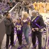 Chili (JOHN TRAVOLTA) talks with Martin Weir (DANNY DeVITO), ANNA NICOLE SMITH, and PHIL JACKSON after a Lakers game in MGM Pictures' comedy BE COOL.