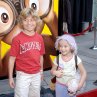 Shane Baumel and Mikaila Baumel at event of Curious George