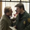 Still of Gregg Henry and Nathan Fillion in Slither