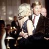 Still of Kim Basinger and Robert Redford in The Natural