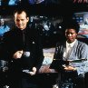 Still of Bill Murray and Alfre Woodard in Scrooged