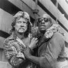 Still of Keith David and Roddy Piper in They Live