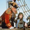 Still of Sarah Polley and John Neville in The Adventures of Baron Munchausen